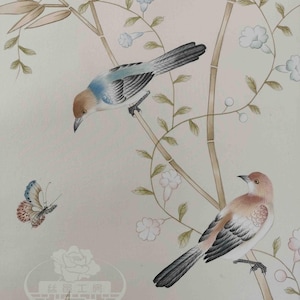 Hand-painted chinoiserie wall panels featuring bamboo, birds, and white peonies on ivory silk, custom artwork in a soft green garden landscape