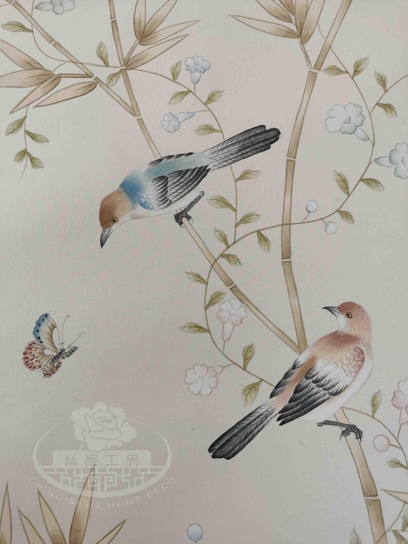 Hand-painted chinoiserie wall panels featuring bamboo, birds, and white peonies on ivory silk, custom artwork in a soft green garden landscape