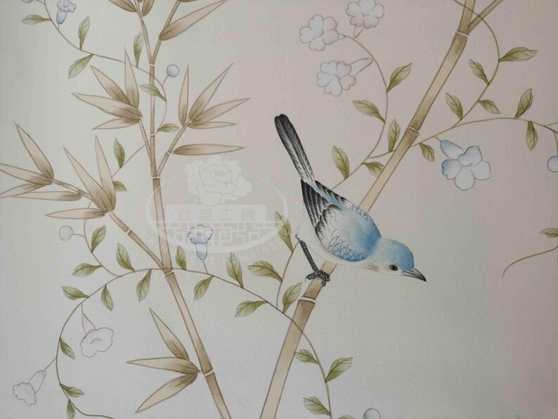 Hand-painted chinoiserie wall panels featuring bamboo, birds, and white peonies on ivory silk, custom artwork in a soft green garden landscape