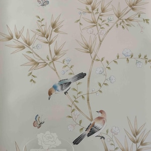 Hand-painted chinoiserie wall panels featuring bamboo, birds, and white peonies on ivory silk, custom artwork in a soft green garden landscape