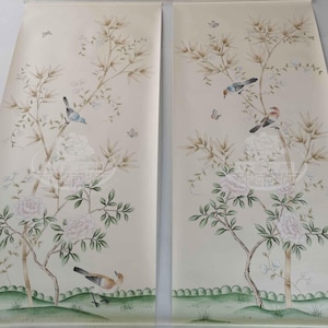 Hand-painted chinoiserie wall panels featuring bamboo, birds, and white peonies on ivory silk, custom artwork in a soft green garden landscape