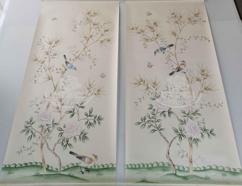 Hand-painted chinoiserie wall panels featuring bamboo, birds, and white peonies on ivory silk, custom artwork in a soft green garden landscape