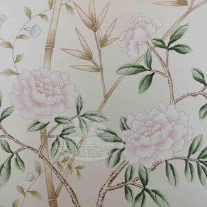Hand-painted chinoiserie wall panels featuring bamboo, birds, and white peonies on ivory silk, custom artwork in a soft green garden landscape