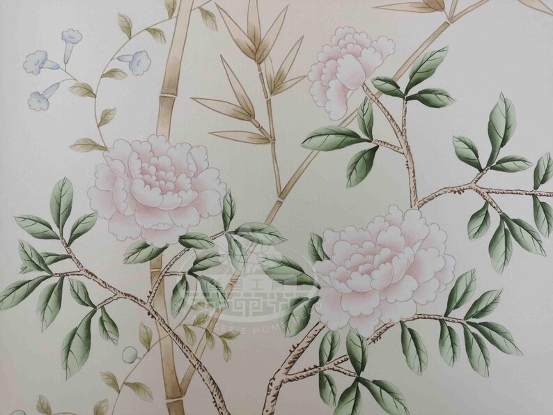 Hand-painted chinoiserie wall panels featuring bamboo, birds, and white peonies on ivory silk, custom artwork in a soft green garden landscape