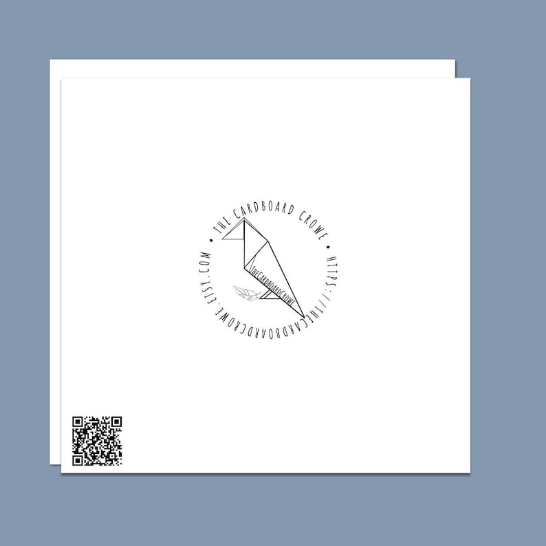 May include: A black and white logo with a stylized origami bird in a circle. The text around the circle reads "The Cardboard Crowl" and includes the website address "thecardboardcrowl.com" and the website URL "https://thecardboardcrowl.com".