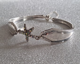 Vintage cutlery bracelet with a starfish diamanté connector, safety chain and magnetic clasp.