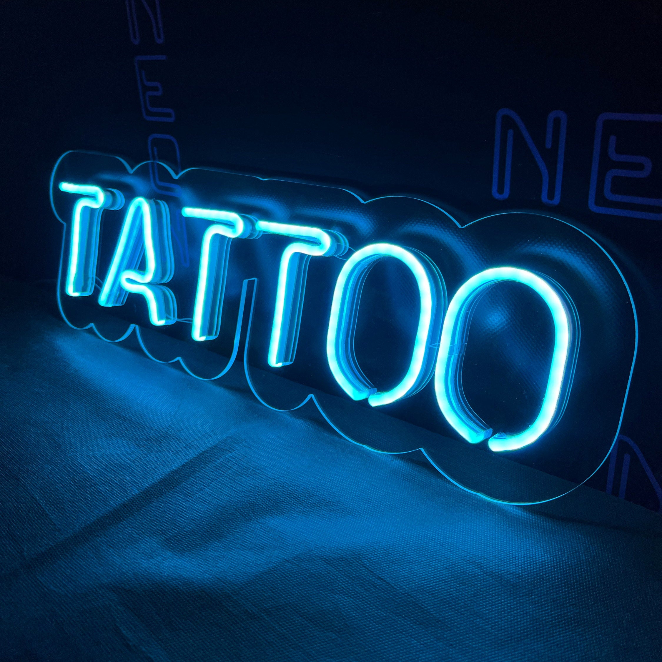 Neon signboard with Piercing  Tattoo at night Stock Photo by kyolshin  12726105