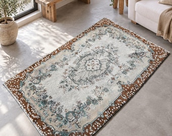 Alfombra Isparta marrón y beige, tejida a mano, alfombra floral de lana, 1,13 x 2,07 m, estilo turco vintage anudado a mano.