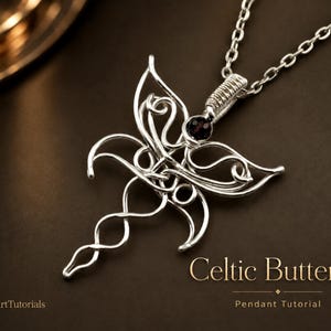 May include: A silver wire-wrapped pendant shaped like a butterfly with a small dark red gemstone at the top, suspended from a silver chain. The text "Celtic Butterfly Pendant Tutorial" and "©WireArtTutorials" is visible in the corner.