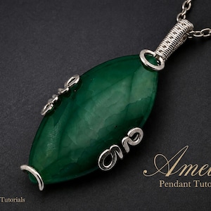 May include: A marquise-shaped green gemstone pendant wrapped in silver-toned wire with decorative scroll accents. The pendant hangs from a silver-toned chain. The text "Amelie Pendant Tutorial" and "WireArtTutorials" is visible on the image.