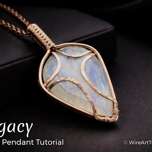 May include: A copper-coloured wire-wrapped pendant necklace featuring a pear-shaped, iridescent stone. The pendant is suspended from a matching chain. The image includes the text "Legacy" and "Cross Pendant Tutorial".