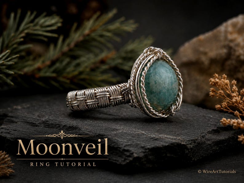 May include: A silver wire-wrapped ring featuring a round, teal-colored stone set in a twisted metal frame. The band has a woven metal pattern. The text "Moonveil RING TUTORIAL" is printed in gold lettering at the bottom left of the image.