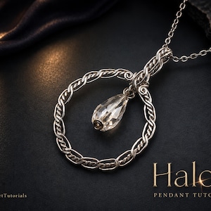 May include: A silver-toned wire-wrapped circular pendant featuring a central clear teardrop-shaped crystal bead suspended from a matching chain. The text "Haloa PENDANT TUTORIAL" and "©WireArtTutorials" is printed in the lower section of the image.