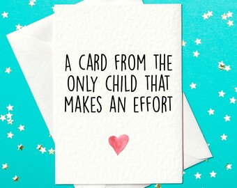 May include: A white card with black text that reads "A card from the only child that makes an effort." A small pink heart is in the bottom center of the card.