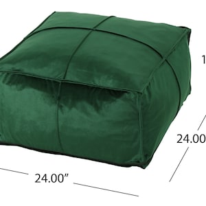 May include: A square green velvet ottoman with a tufted design. The ottoman measures 24 inches by 24 inches by 12 inches.