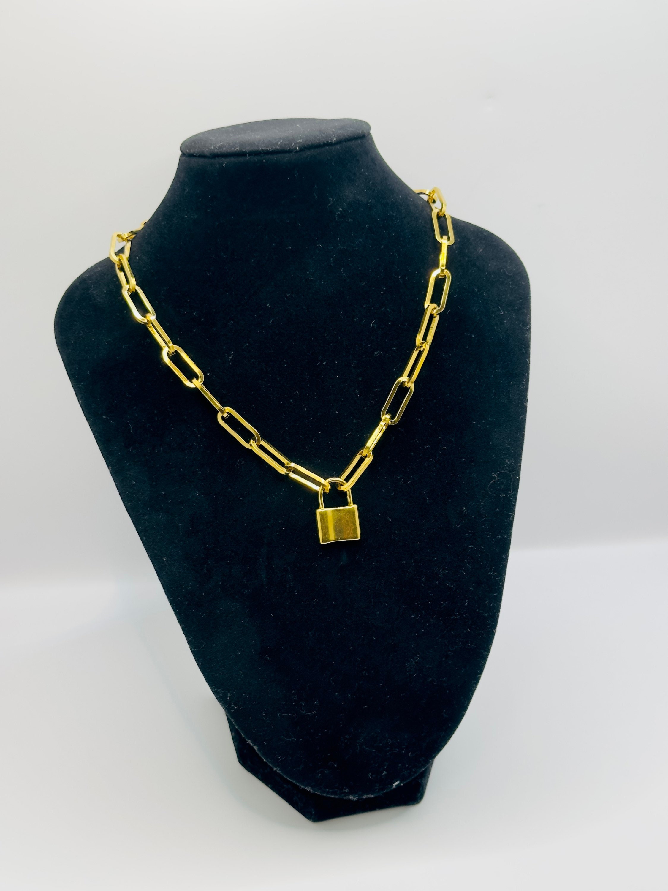 Louis Vuitton Gold Metal Love Lock Pendant Necklace For Sale at