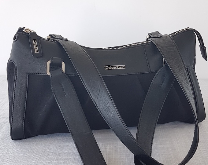 Vintage Calvin Klein Black Baguette Bag, Calvin Klein Logo Pattern on Black Canvas, Faux Leather Trim, Zipper Closure