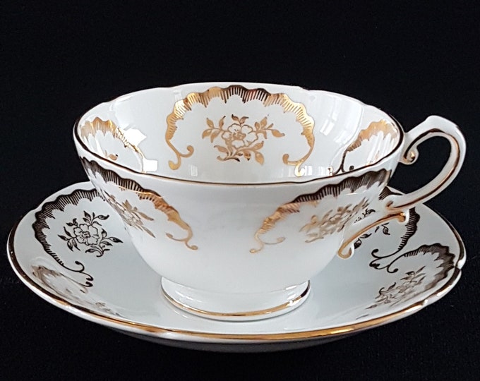 Vintage Fine Bone China English Tea Cup and Saucer, White with Gold Floral Overlay, Made in England, 1960s