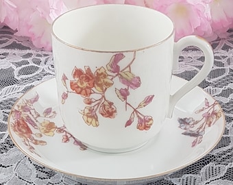 Antique Limoges Porcelain Cup and Saucer: Hand Painted Floral Design, France (1890-1902)