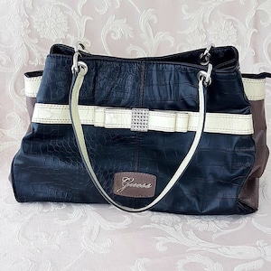 GUESS Hesperia Satchel, Black Faux Crocodile Leather, Rhinestone Bow, Multi Pocket, Zippered, Snap Closure