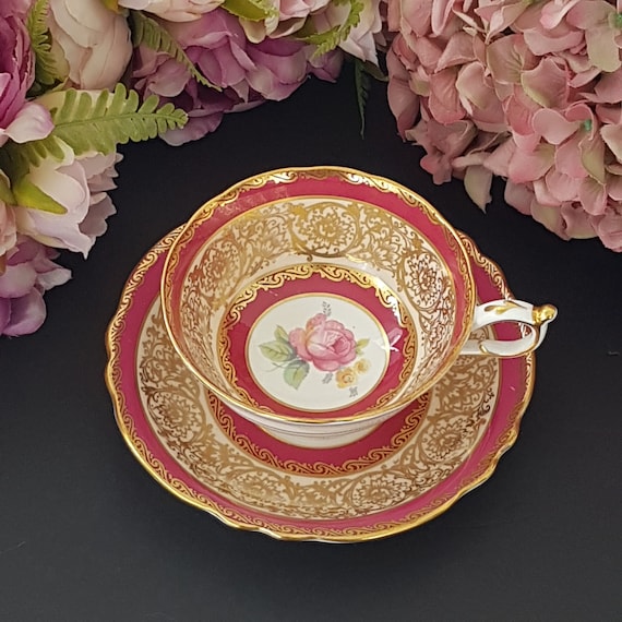 Paragon Pink Rose Tea Cup and Saucer: English Bone China, Gold Floral Overlay