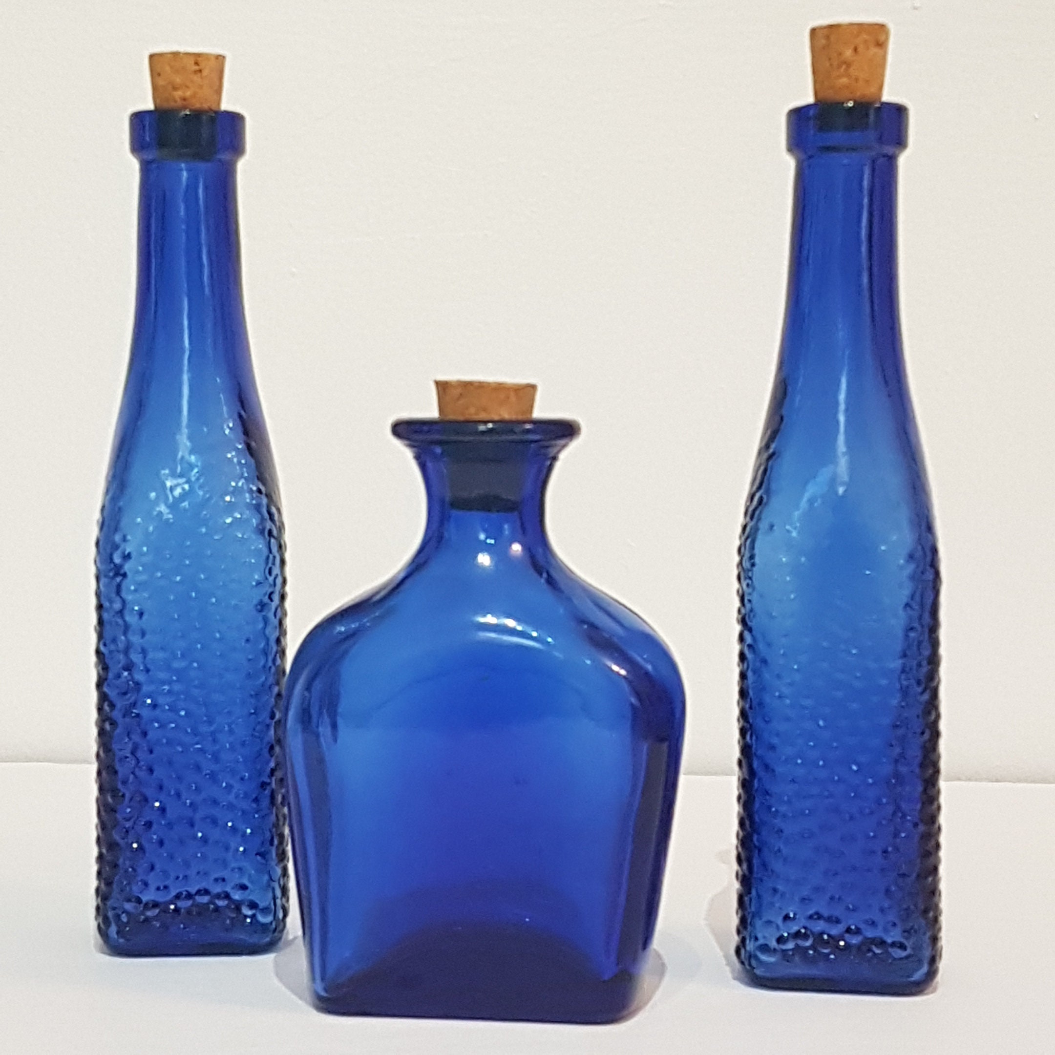 Vintage French Blue Pressed Decorative Glass Bottles - Set of 3.
