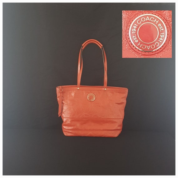 Glovetan dinky crossbody leather handbag Coach Orange in Leather - 38243648
