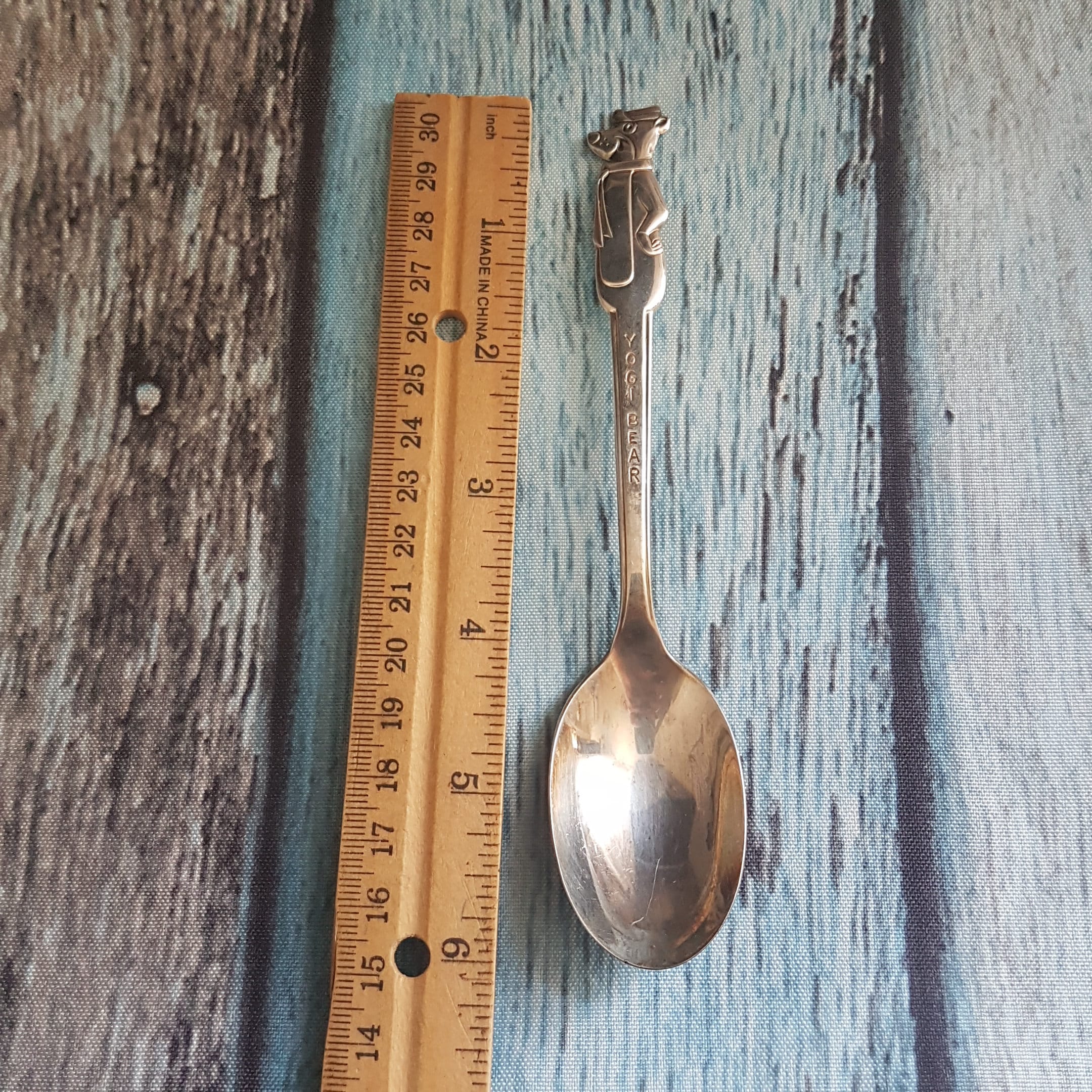 Old company shop plate spoon