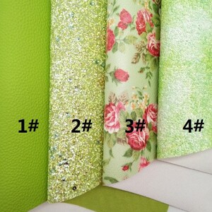 May include: Four different green textured fabrics are displayed. The first is a solid, smooth leather-like material. The second is covered in glitter. The third has a floral pattern with red roses. The fourth has a speckled texture. Each fabric is labeled with a number.