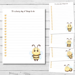 May include: Printable to-do list with a cute cartoon bee and the text "It's a buzzy day of things to do".