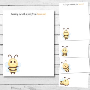 May include: A set of five white note cards, each featuring a cute cartoon bee illustration. The top card has the text "Buzzing by with a note from Savannah".
