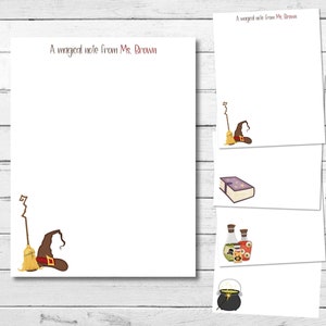 May include: White notepaper with the text "A magical note from Ms. Brown" in burgundy. The stationery features illustrations of a witch's hat, broom, spell book, potion bottles, and a cauldron.
