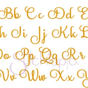 May include: A set of uppercase letters in a cursive font, written in gold. The letters are arranged in alphabetical order, with each letter appearing twice.