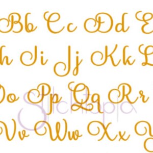 May include: A set of uppercase letters in a cursive font, written in gold. The letters are arranged in alphabetical order, with each letter appearing twice.