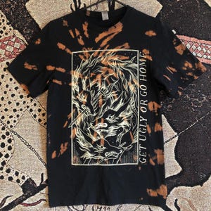 GET UGLY or go home Tシャツ | スクリーンプリント | フォークパンクシャツ | クラストパンク | トランスジェンダー製 | クィア製 | スクリーンプリント | 左翼シャツ