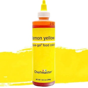 Peut inclure: Une bouteille de 296 g de colorant alimentaire jaune citron. La bouteille est étiquetée "jaune citron qua-gel colorant alimentaire" et "Chefmaster".