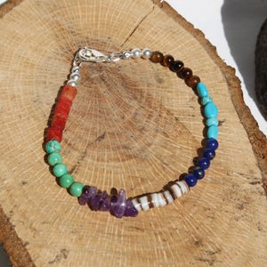 Multi colored bracelet with Red Coral, Amethyst, Shell, Lapis, Turquoise, Tiger-eye and glass beads