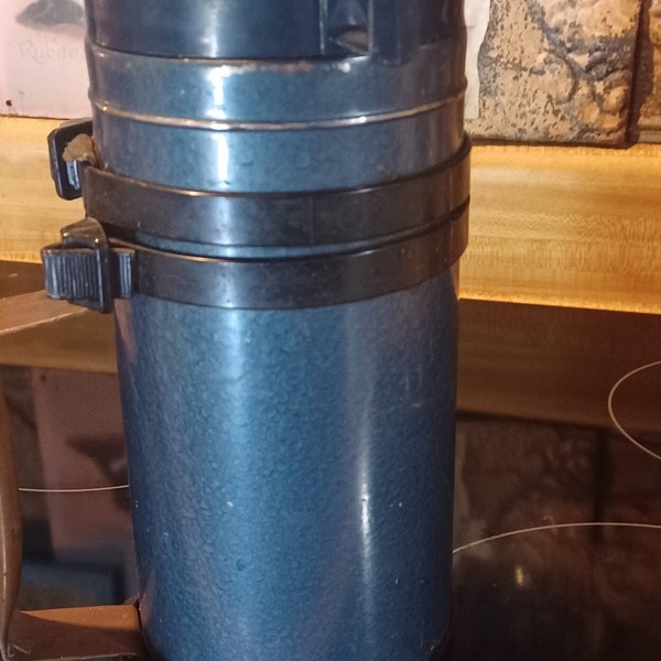 Vintage steel thermos with vacuum seal and cup