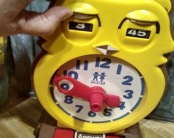 tomy owl clock