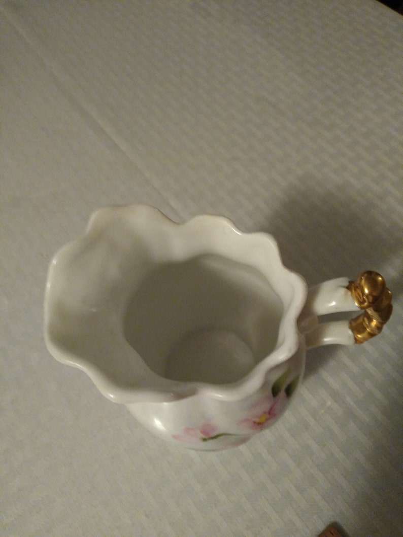 Old vintage hand painted vase