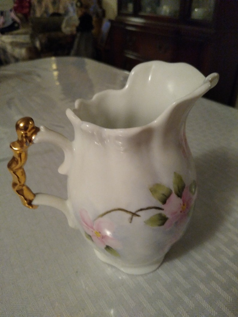 Old vintage hand painted vase