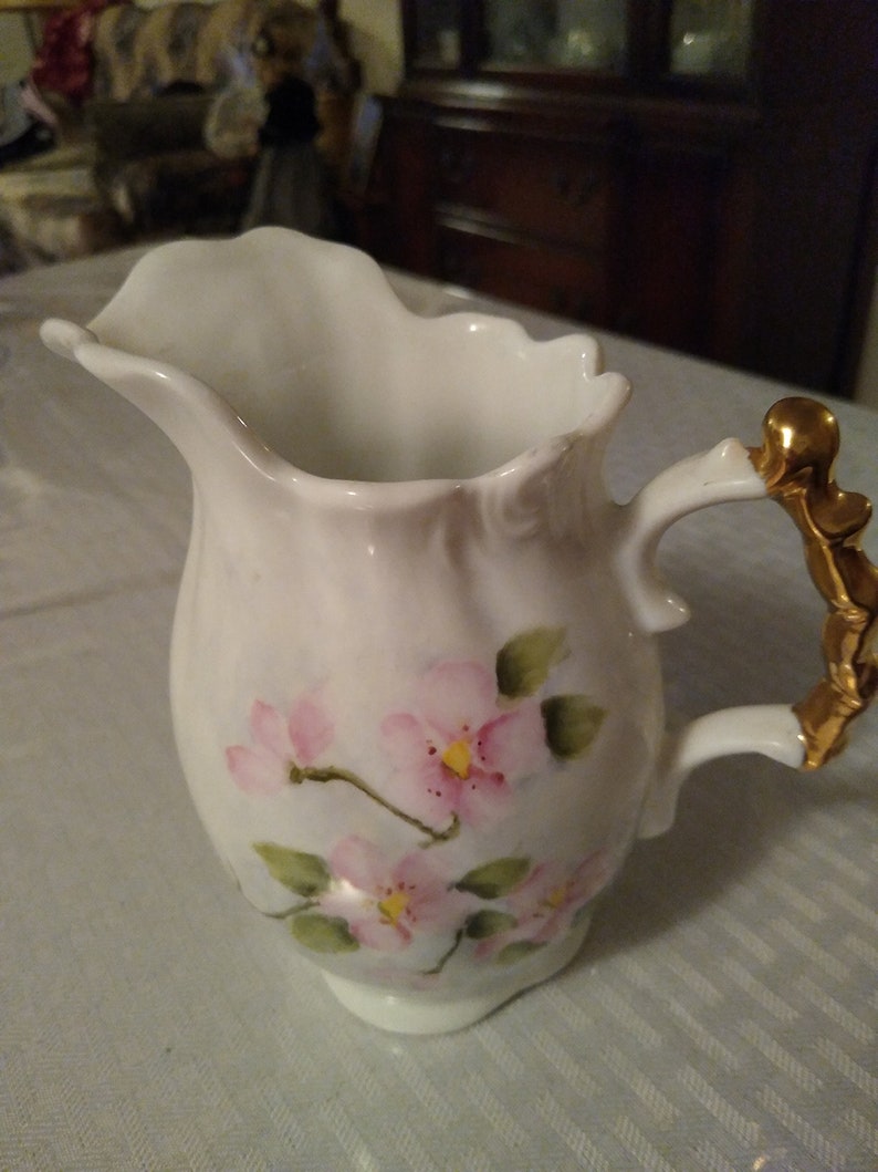 Old vintage hand painted vase