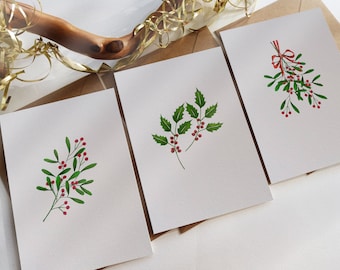 Tarjetas botánicas - Juego de 3 tarjetas de diseño navideño variadas - Muérdago de cinta, hojas de acebo, muérdago minimalista - Originalmente pintadas a mano.