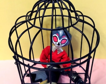 Stolas em uma gaiola de pássaros