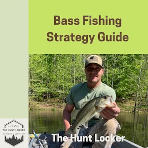 May include: A man holding a largemouth bass in a boat, with the text "Bass Fishing Strategy Guide" and "The Hunt Locker." The background shows a lake and trees. The man is wearing a cap and a green shirt.