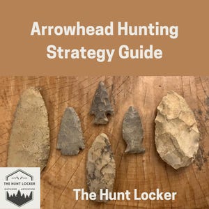 May include: An image of an "Arrowhead Hunting Strategy Guide" with several arrowheads of varying sizes and shapes. The arrowheads are in shades of gray and tan, set against a wooden background. The Hunt Locker logo is visible.