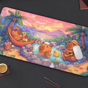 May include: A colorful mousepad featuring cartoon capybaras enjoying a tropical vacation. One relaxes in a hammock, another soaks in a hot spring, and a third plays a guitar. The background depicts a sunset over a beach with palm trees.