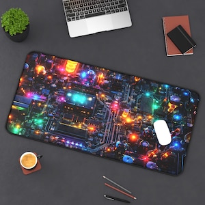 May include: A rectangular computer mouse pad with a vibrant, colorful circuit board design. The pad features a black border and is covered in a complex pattern of glowing lights in shades of blue, green, orange, and red. A white computer mouse rests on the pad.