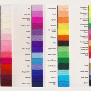 May include: A color chart of 40 different colors of tulle fabric. The colors are arranged in columns and labeled with their names. The colors include white, ivory, pink, red, orange, yellow, green, blue, purple, and black.
