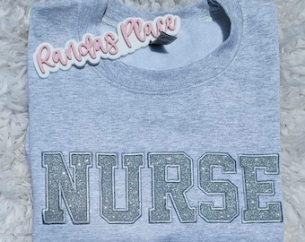 Sudadera de enfermera con bordado brillante, cuello redondo médico acogedor